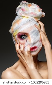 Girl With Heavy Makeup And Bandage On Head