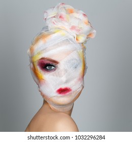 Girl With Heavy Makeup And Bandage On Head