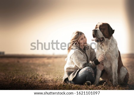 Similar – Image, Stock Photo Happy smiling dog with its pretty young owner