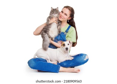 A girl with her cat and dog - Shutterstock ID 2180909563