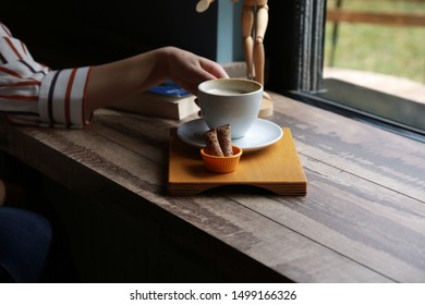 a girl with her coffee 