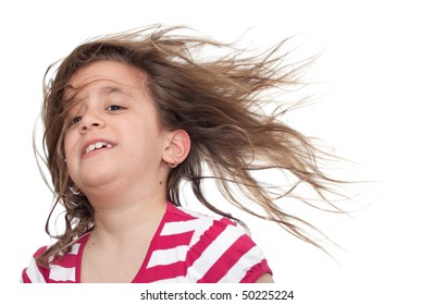 Girl With Her Hair Blowing In The Wind Isolated On White