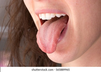 Girl With Her Tongue Out