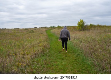 Girl Hiking In Badlands National Park Desert 