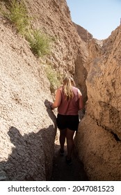 Girl Hiking In Badlands National Park Desert 