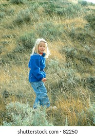 Girl hiking in the prairies