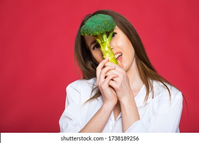 Girl Hold Vegetable. Organic Nutrition. Woman Hold Broccoli. Healthy Vegetarian Recipes. Amazing Broccoli Facts You Should Know. Healthy Food. Dieting Concept. Eat Healthy.