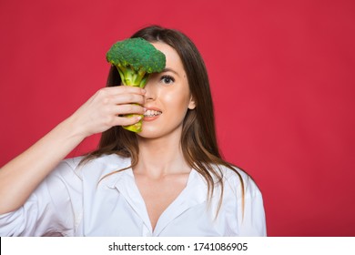 Girl Hold Vegetable. Organic Nutrition. Woman Hold Broccoli. Healthy Vegetarian Recipes. Amazing Broccoli Facts You Should Know. Healthy Food. Dieting Concept. Eat Healthy.