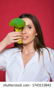 Girl Hold Vegetable. Organic Nutrition. Woman Hold Broccoli. Healthy Vegetarian Recipes. Amazing Broccoli Facts You Should Know. Healthy Food. Dieting Concept. Eat Healthy.