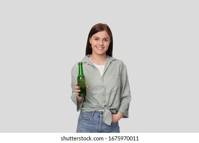 Girl Holding Beer Bottle Isolated. Beer Bottle in Hands