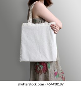 Girl Is Holding Blank Cotton Eco Tote Bag, Design Mockup.