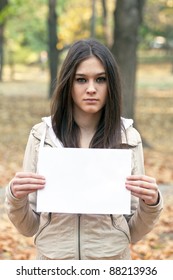 Girl Holding Blank Paper