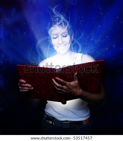 a girl holding a book of dreams