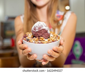 
Girl Holding Bowl Of Ice Cream.