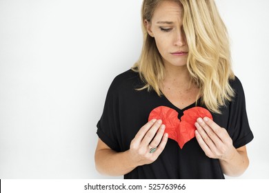 Girl Holding Broken Heart Concept
