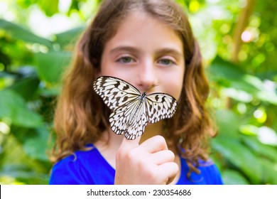 Girl holding finger Rice Paper butterfly Idea leuconoe in outdoor