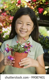 Girl Holding Flowers