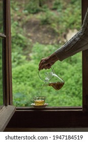 Girl Holding Greentea Glass Teapot