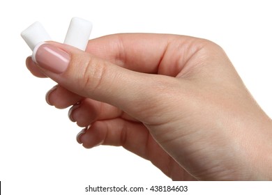 Girl Holding In Hand Chewing Gum In The Form Of Pads Isolated On White Background