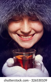 Girl Holding A Hot Drink Mulled Wine. Closeup