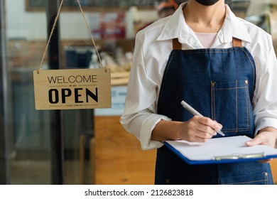 Girl Holding A Menu Food With Open Sign Beside Beverage Restaurant Opening Concept.