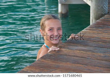 Similar – Image, Stock Photo Girl on jetty Joy Summer