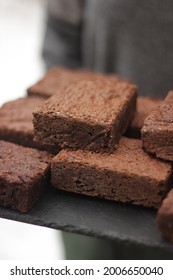 Girl Holding A Tray With Brownie