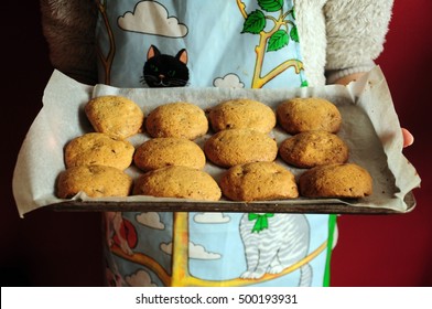 Girl Holding A Tray Of Freshly Baked Cookies 