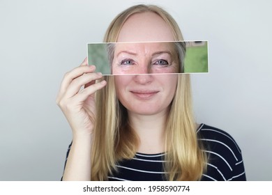 The Girl Holds A Photograph Of Her Old Mother To Her Face. Aging, Genetics, Family Tree And Loss Of Youth Concept. Before And After Age-related Changes. Vintage Photographs