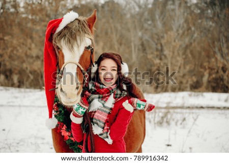 girl with horse at Christmas