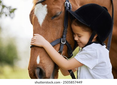 Girl, horse and hug outdoor for animal care, bonding and companion by countryside with riding helmet. Rider, pet and embrace outside for connection, love and trust while on equestrian practice break - Powered by Shutterstock