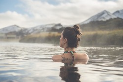 Girl In A Hot Spring In Iceland Landmannalaugar. Relaxing In A Natural Hot Bath.