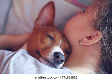 The Girl Hugs The Basenji Dog, Toned.