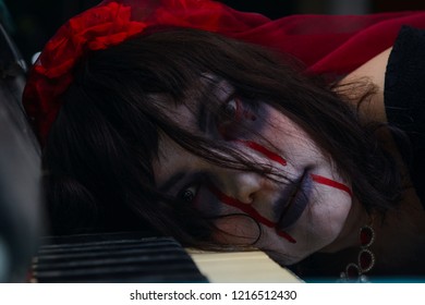girl in the image of the "dead bride" lay down on the piano keys