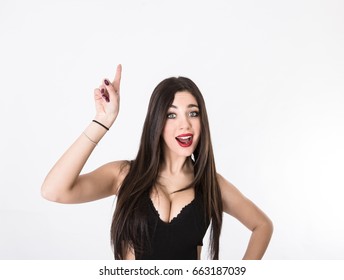 Girl Indicated Empty Space With Finger, Light Background