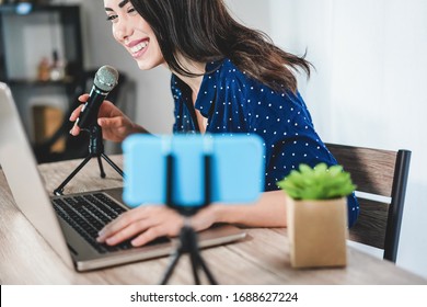 Girl influencer girl preparing video set while creating social media contents - Young woman having fun with technology trends - New smart working concept - Focus on face