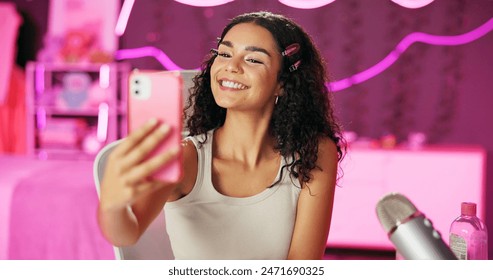 Girl, influencer and selfie for live stream for social media, connection or audience for online. Female person, gen z and bedroom with tripod for video, content creation and tech at home for website - Powered by Shutterstock