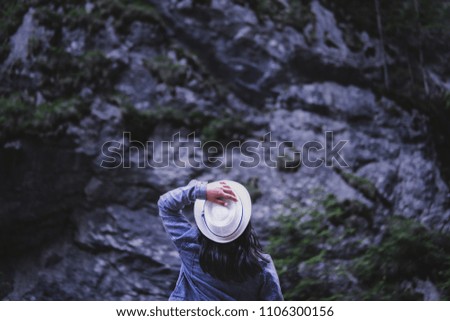 Similar – Image, Stock Photo Low angle view of blonde white girl posing in the forest with trees in the background.