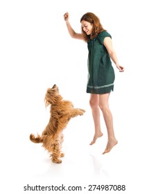 Girl jumping with her dog