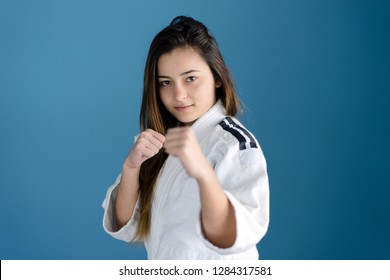 Girl in Karate Taekwondo Fighting Stance - Powered by Shutterstock