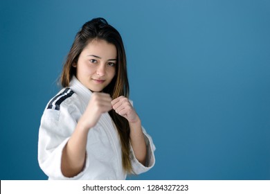Girl in Karate Taekwondo Fighting Stance - Powered by Shutterstock