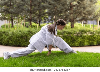 Girl in Karate Taekwondo Fighting Stance - Powered by Shutterstock