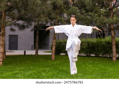 Girl in Karate Taekwondo Fighting Stance - Powered by Shutterstock