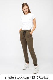 girl in khaki sweatpants and a t-shirt