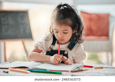 Girl, kid and writing for homework with learning, development and studying for art project in home. Youth, female child and drawing by table with pencil for creativity, growth and education.