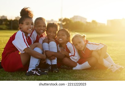 Girl kids, soccer field and team portrait together for competition, game and summer training outdoors in Brazil. Football club, happy young children and sports diversity in development, youth and fun - Powered by Shutterstock