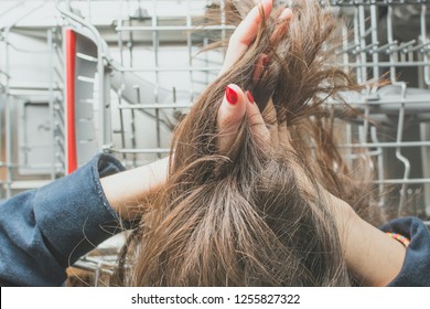 Girl Lays Long Greasy Hair In The Dishwasher Compartment.