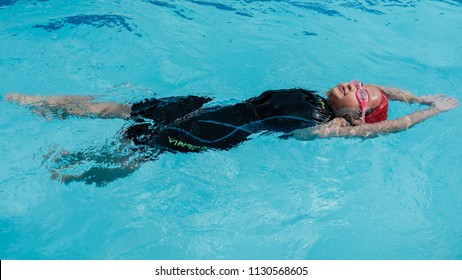 366 Swimming Kid Backstroke Images, Stock Photos & Vectors 