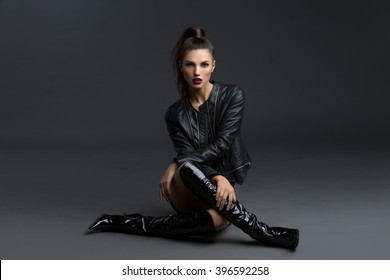 Girl In Leather Jacket And Boots