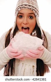 Girl Licking Giant Ice Cube On White Isolated Background